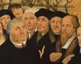Porträtgruppe von Reformatoren, darunter Martin Luther und John Calvin, mit ernsten Blicken und prächtigen Gewändern.