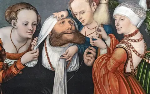 Lucas Cranach malt drei Frauen, die einen Mann mit Bart und weißem Tuch um den Kopf umgeben. Eine hält ein Spinnrad.