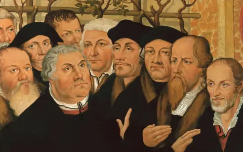 Porträtgruppe von Reformatoren, darunter Martin Luther und John Calvin, mit ernsten Blicken und prächtigen Gewändern.