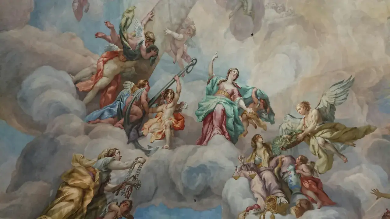 Deckenmalerei mit vielen geflügelten Wesen, die wie engel echt wirken, umgeben von Wolken und himmlischen Lichtern.