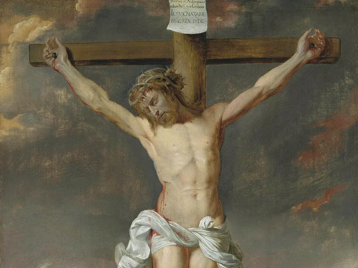 Gemälde zeigt Jesus am Kreuz, mit Dornenkrone und blutenden Wunden. Die Tafel über ihm erklärt, warum Jesus gekreuzigt wurde.