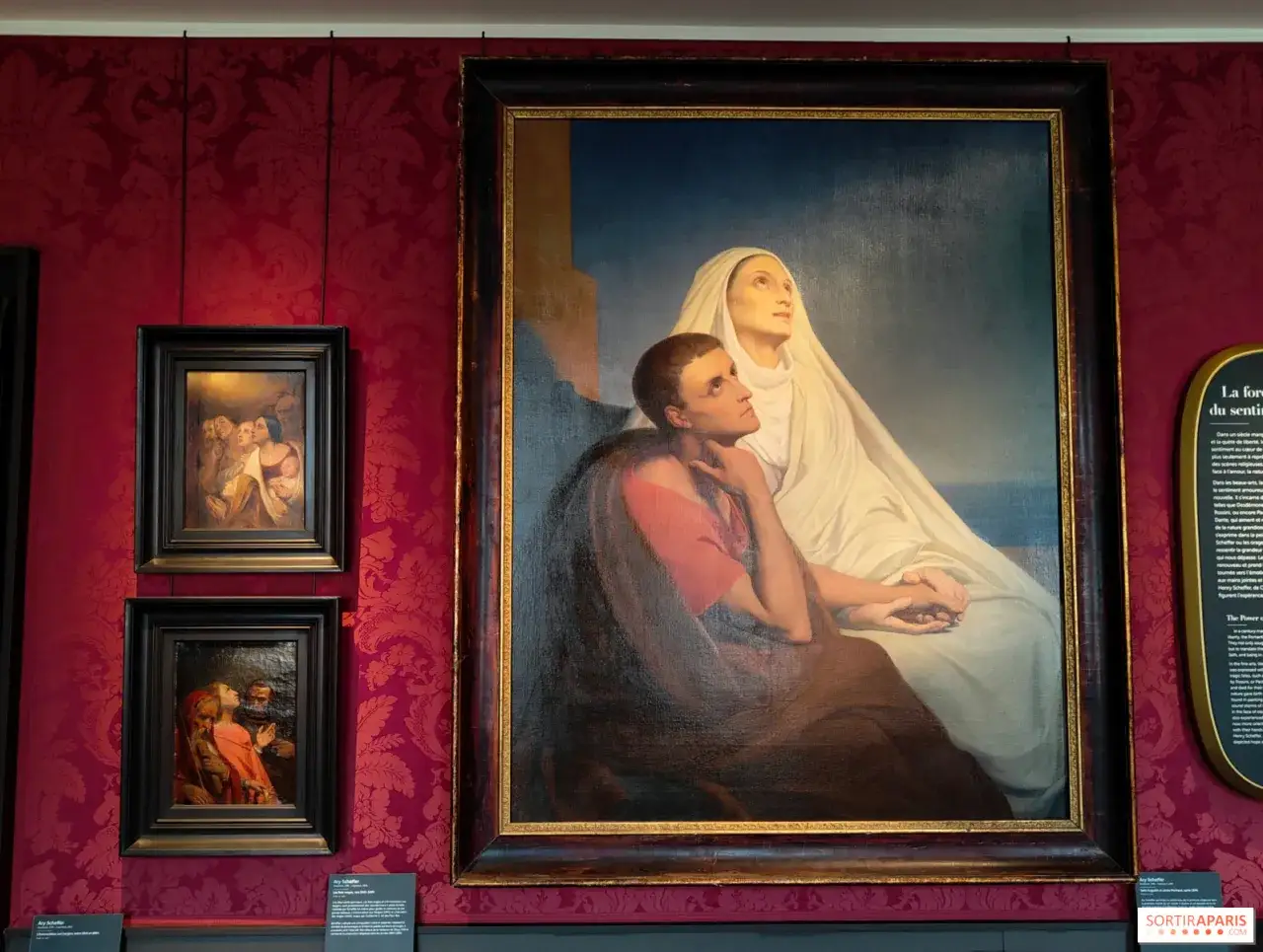 Gem&auml;lde von Ary Scheffer: Eine Frau in Wei&szlig; und ein Mann in Rot blicken hoffnungsvoll nach oben.